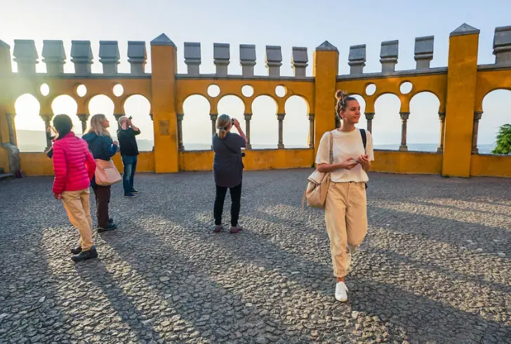 Solo Female Traveler Admiring Historical Architecture